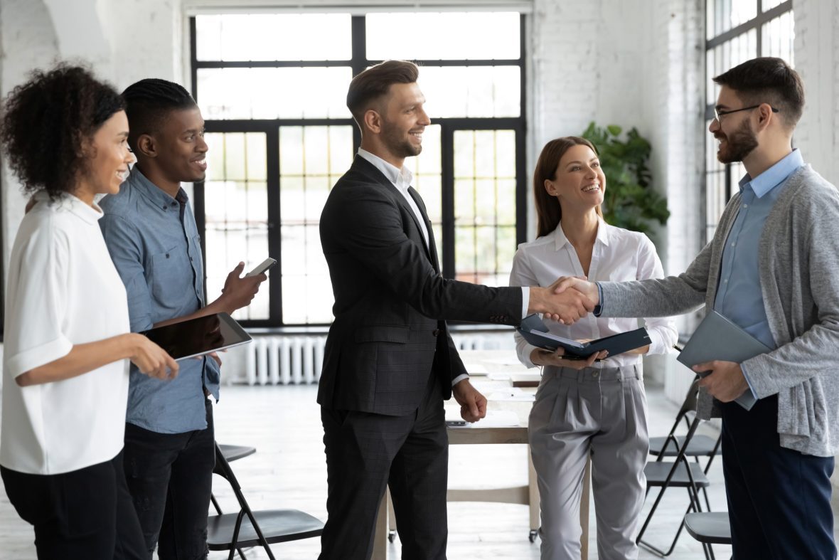Shaking hands during networking event