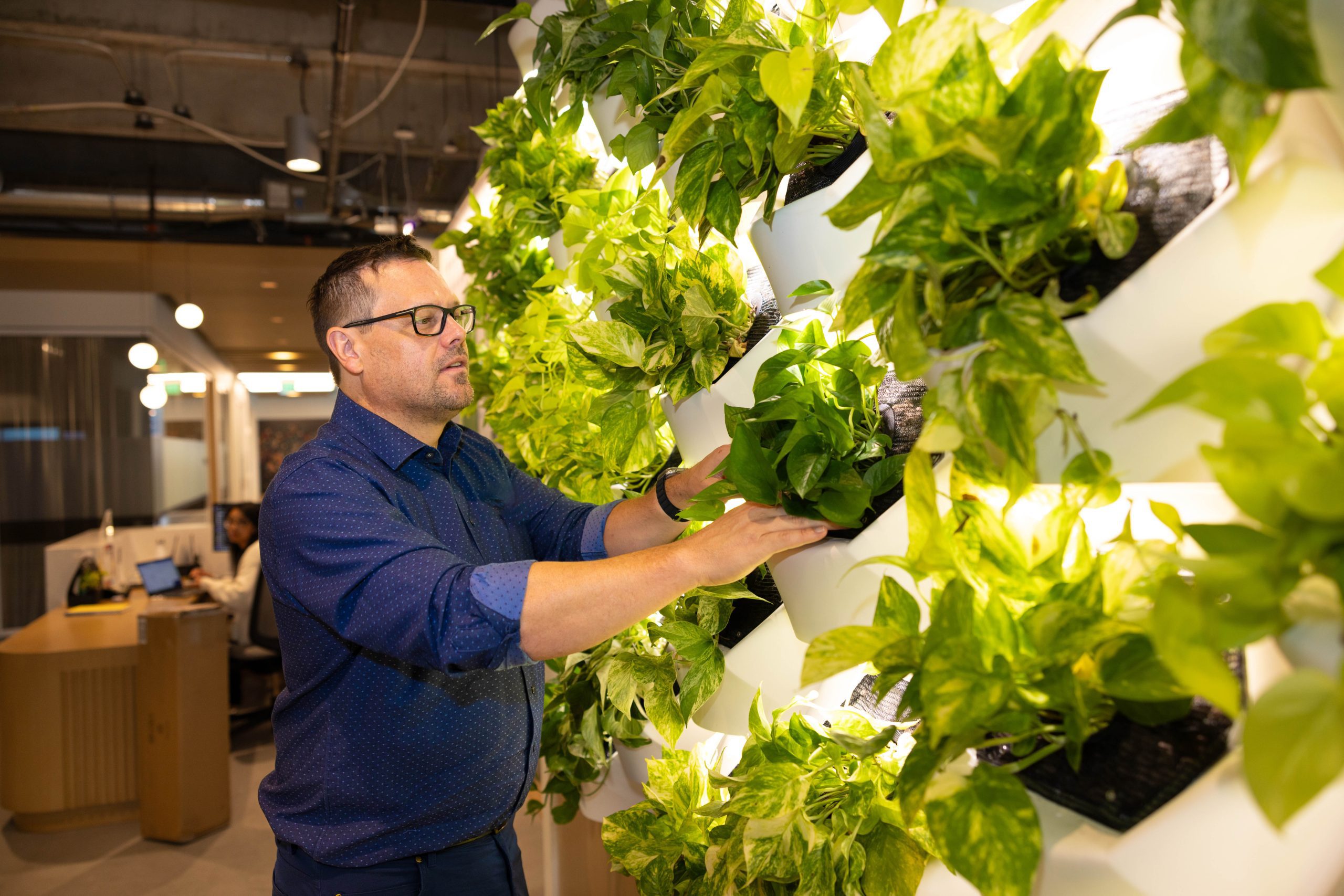 Jefferson Ellinger with plant wall
